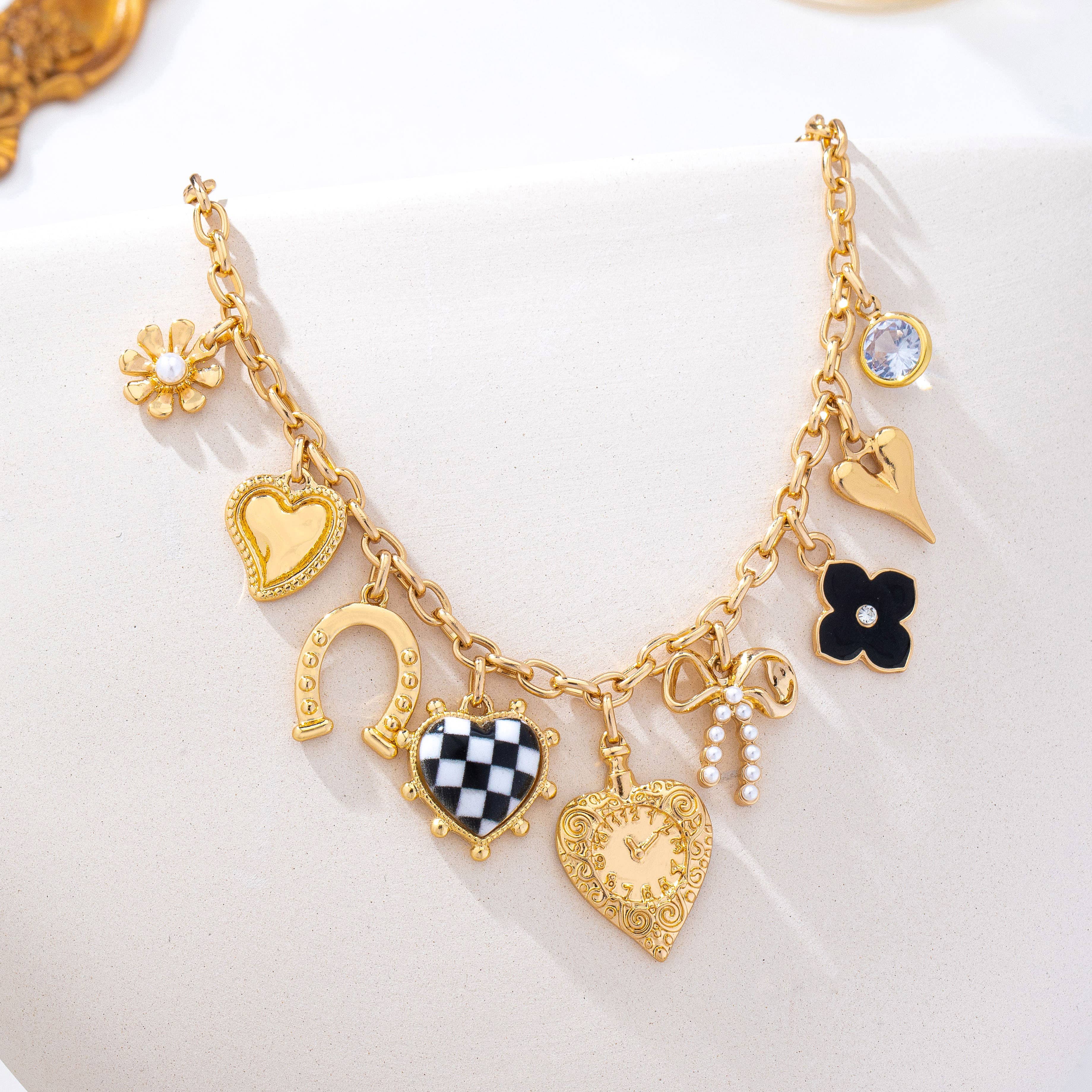 Checkered HeartPearl Bow Multi-Charm Link Necklace| 80N93113