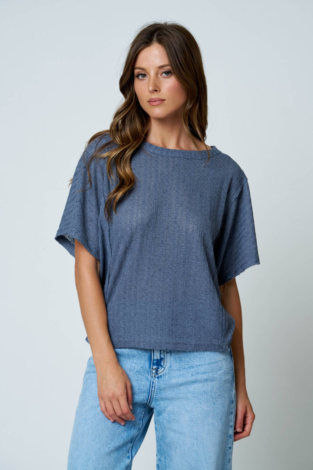 DOLMAN SHORT SLEEVE EXPOSED SEAM TEXTURED KNIT TOP