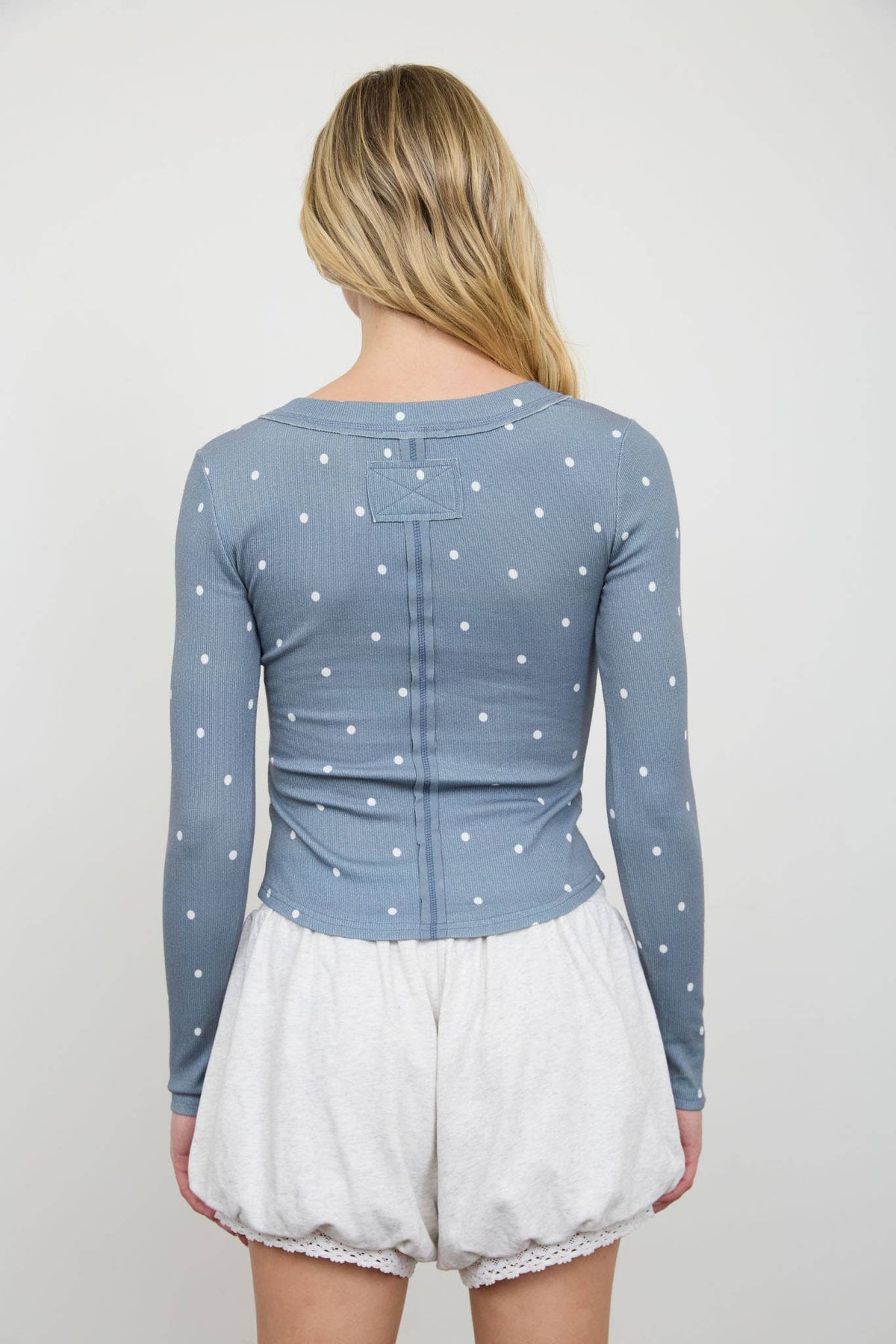 POLKA DOT LONG SLEEVE HENLEY KNIT TOP