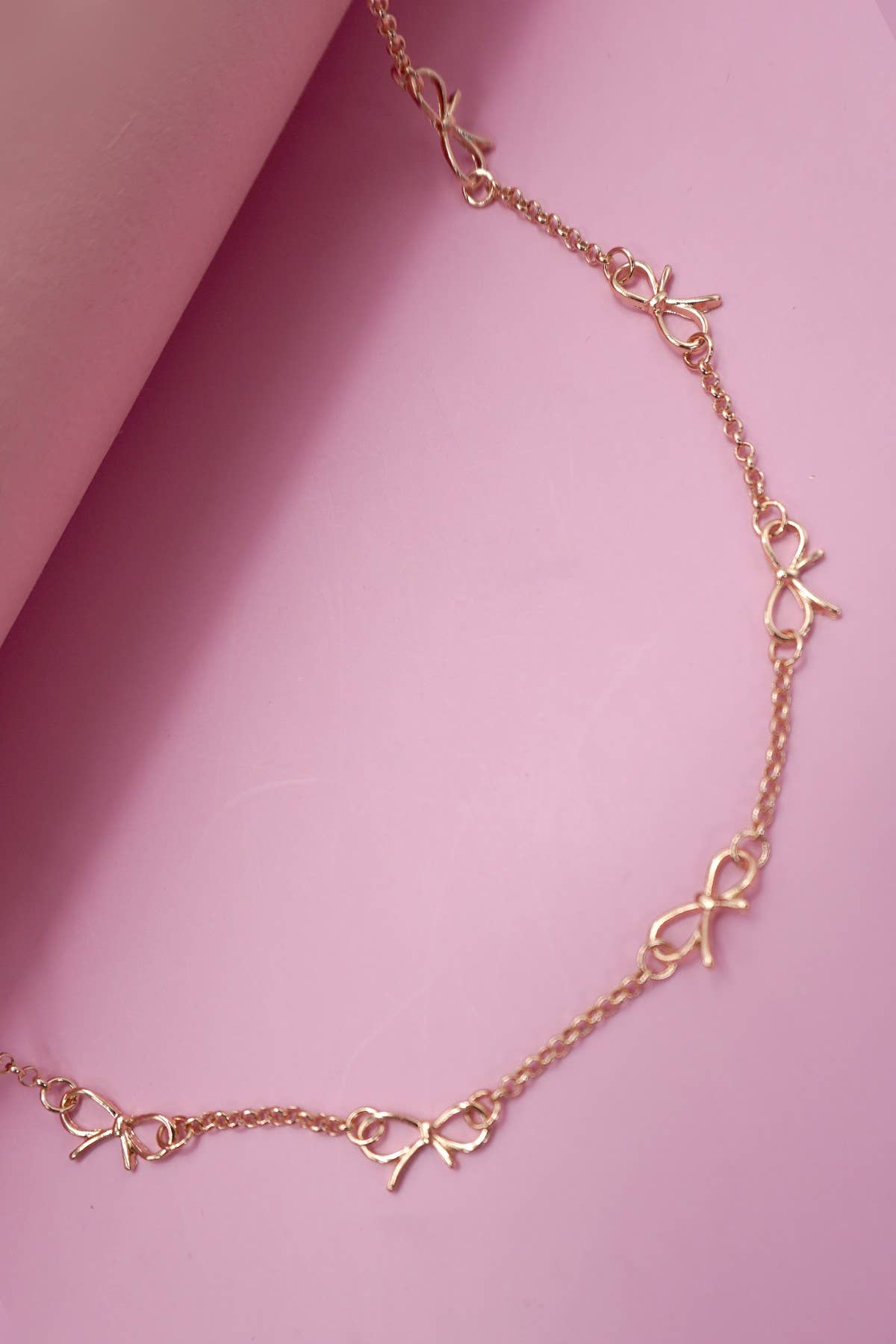 CUTOUT BOW STATION NECKLACE | 80N91531