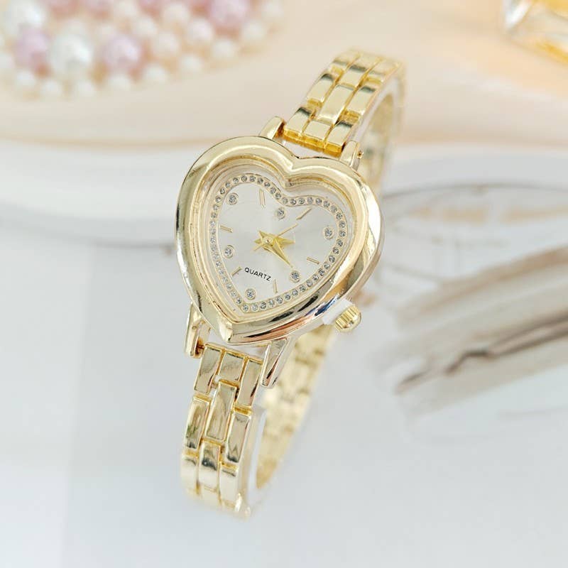 HEART DIAL OVAL BAND BRACELET WATCH | 40W3000