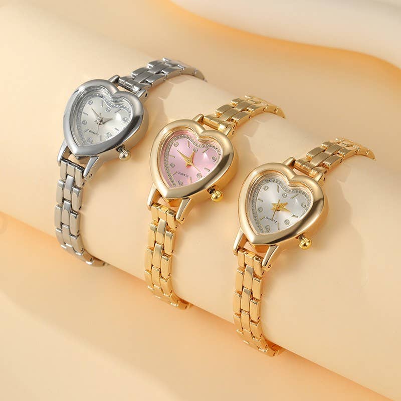 HEART DIAL OVAL BAND BRACELET WATCH | 40W3000